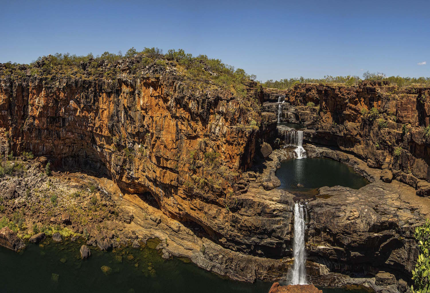 Experience outback experiences in Australia on a cruise along the coast and see Kimberley waterfall