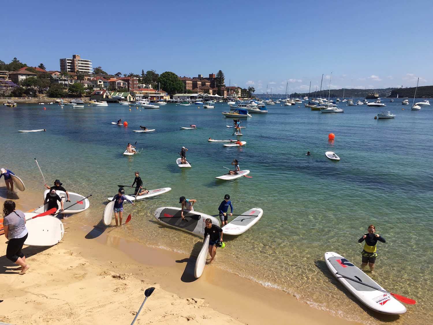 Experience Sydney harbour like the school children do - by stand-up paddle board