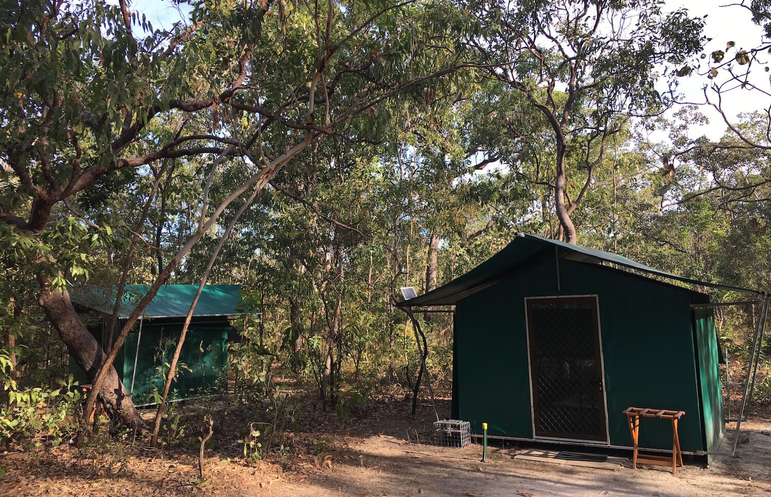 The huts at Sab's campsite with mesh walls.