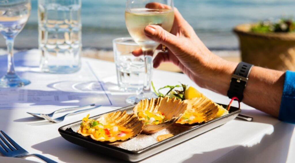 Seafood lunch with glass of wine